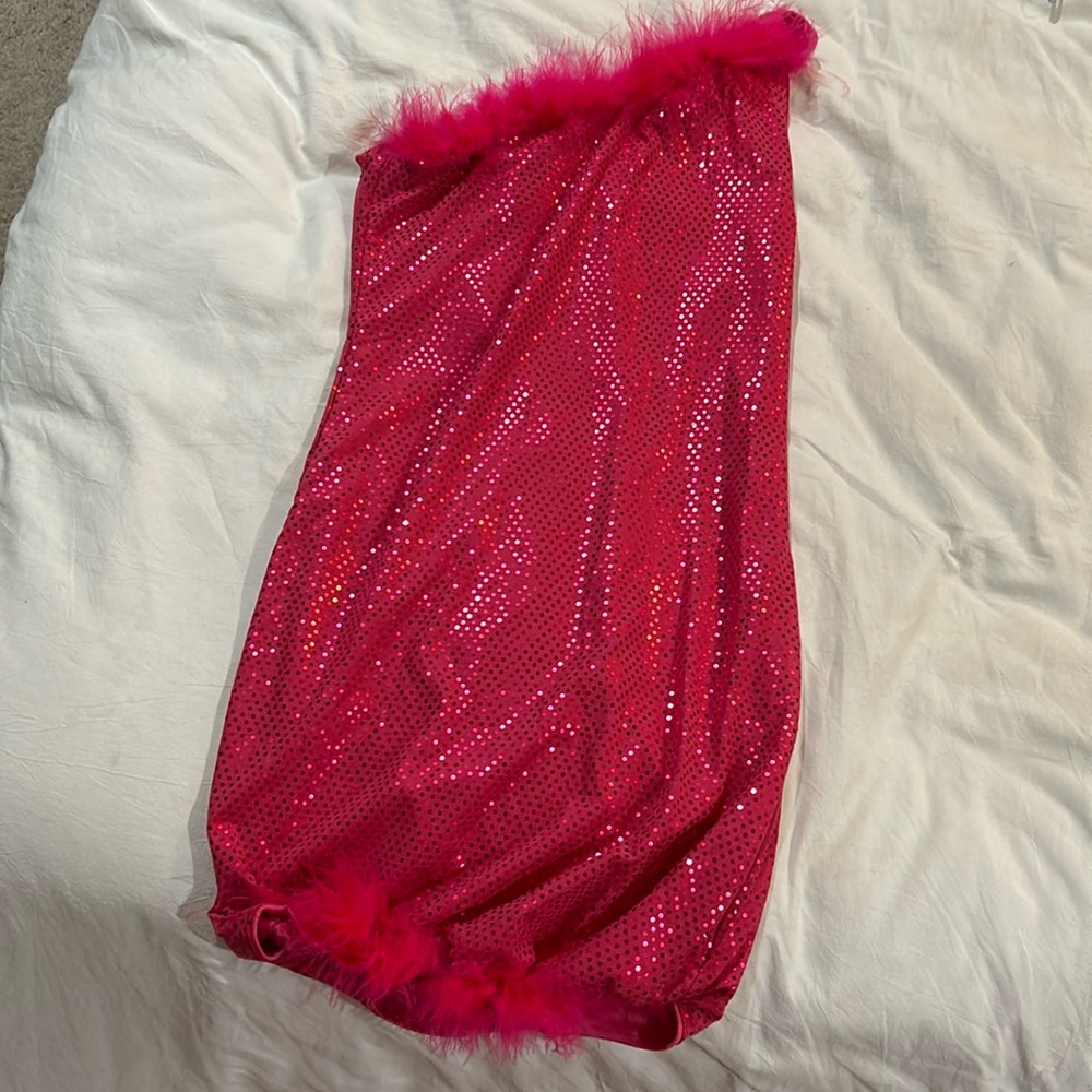 Pink bedazzled dress with feathers on the top